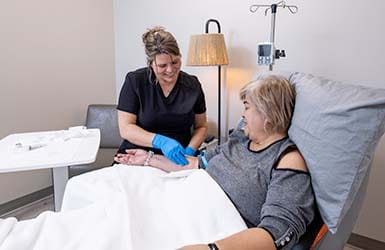 Nurse with infusion patient Nurse with infusion patient